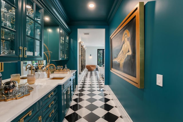 bathroom with vanity and crown molding