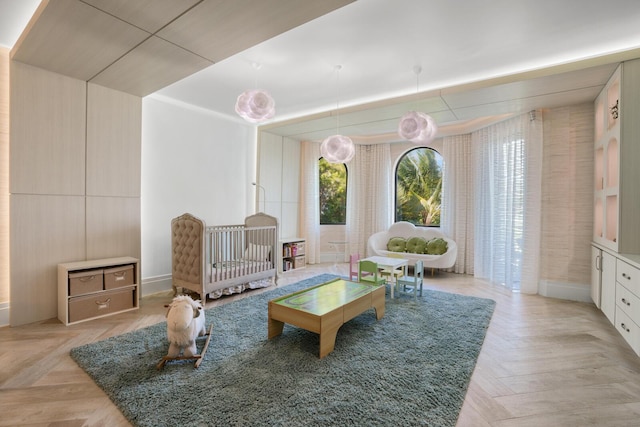 sitting room featuring light parquet floors