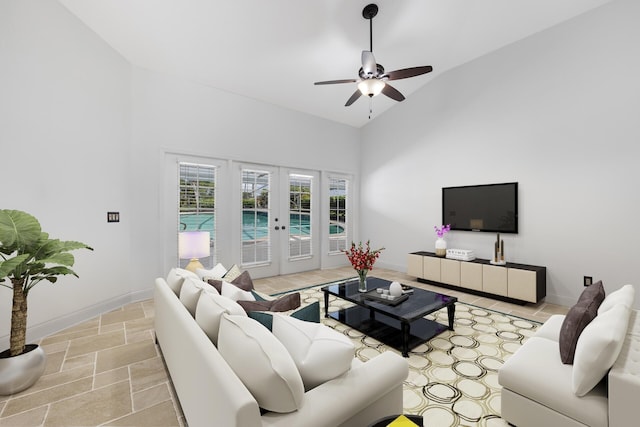 living room featuring french doors, vaulted ceiling, and ceiling fan