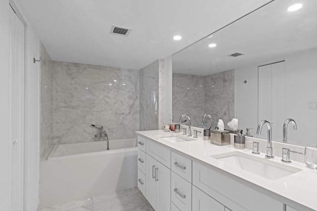 bathroom featuring dual vanity and tile patterned floors