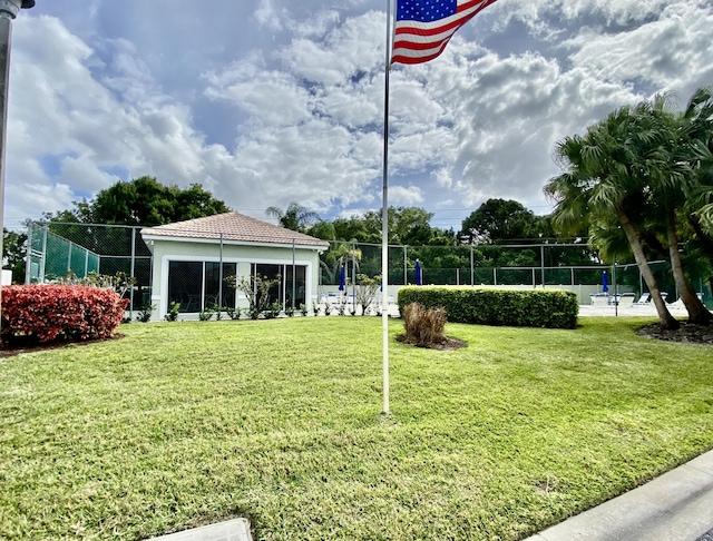 view of community featuring a yard