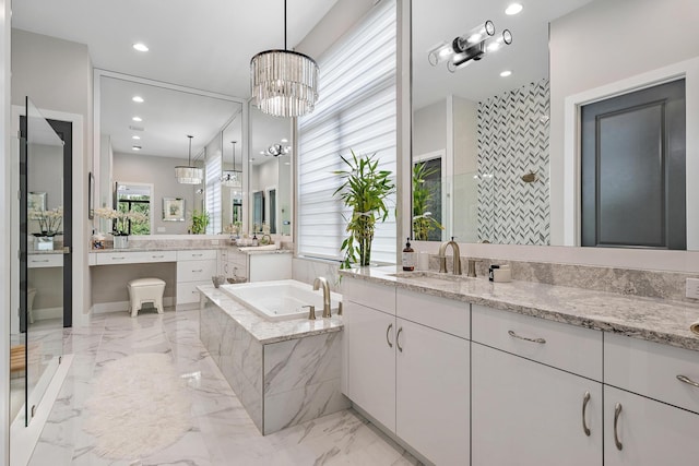 bathroom with vanity, recessed lighting, walk in shower, a bath, and marble finish floor