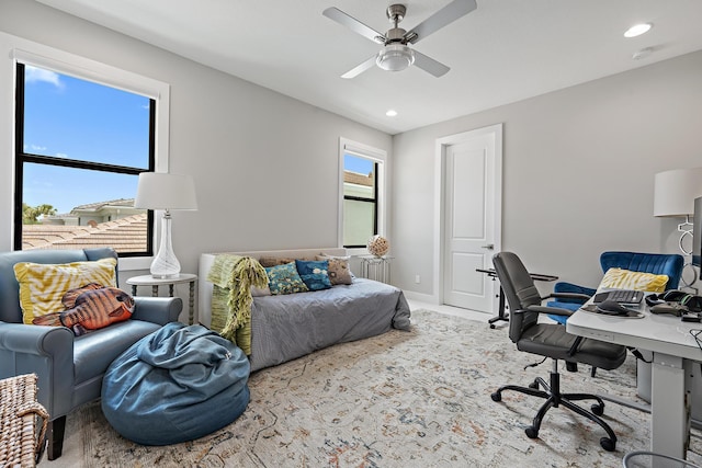 office featuring carpet flooring, recessed lighting, baseboards, and a ceiling fan