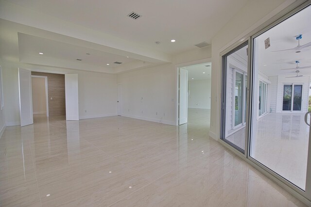 13064 Via Flavia, Placida, FL 33946 - empty room with baseboards, ceiling fan, and recessed lighting