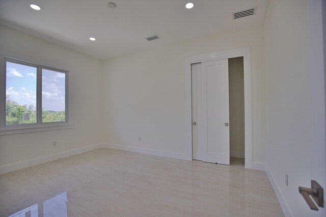 13064 Via Flavia, Placida, FL 33946 - spare room featuring recessed lighting and baseboards