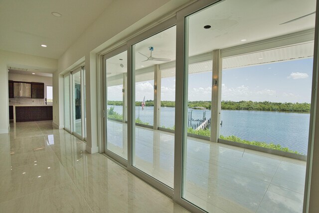 13064 Via Flavia, Placida, FL 33946 - unfurnished sunroom with a water view and healthy amount of natural light