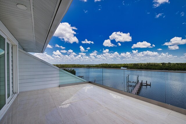 13064 Via Flavia, Placida, FL 33946 - dock area featuring a water view and a balcony