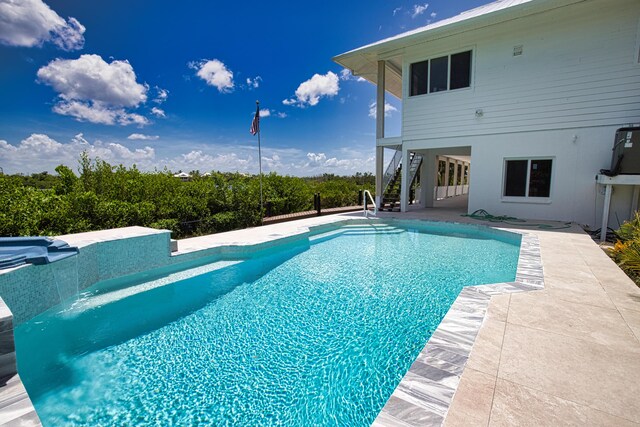 13064 Via Flavia, Placida, FL 33946 - swimming pool with stairway and a patio