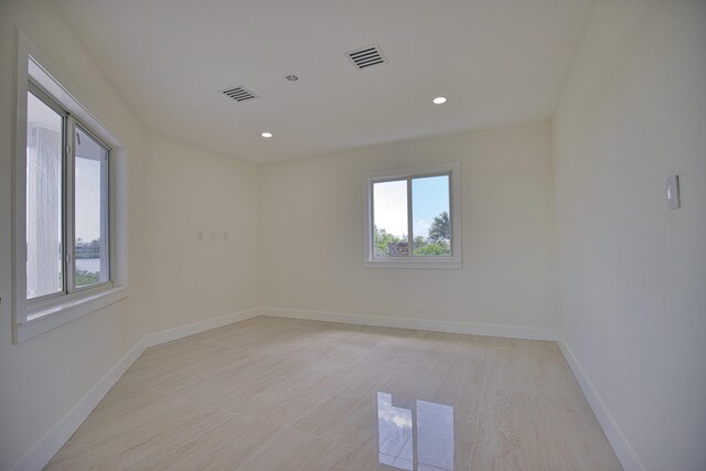 13064 Via Flavia, Placida, FL 33946 - empty room with baseboards and recessed lighting