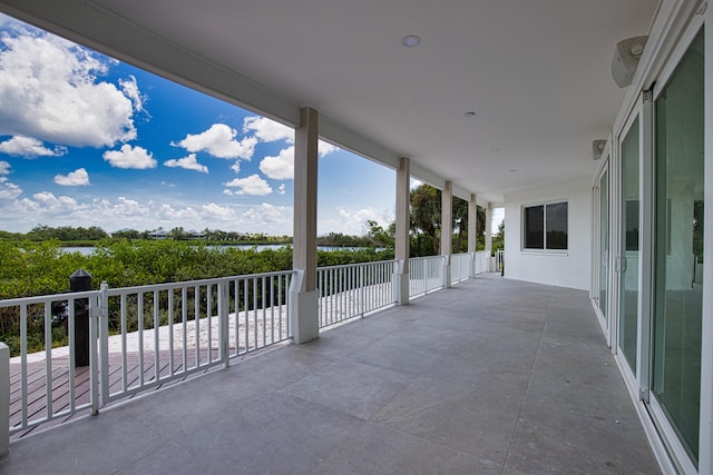 view of patio featuring a balcony