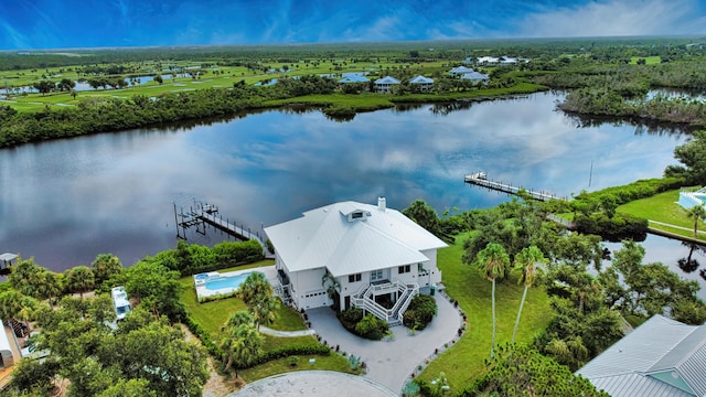 drone / aerial view with a water view