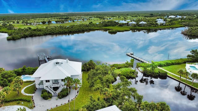 drone / aerial view with a water view