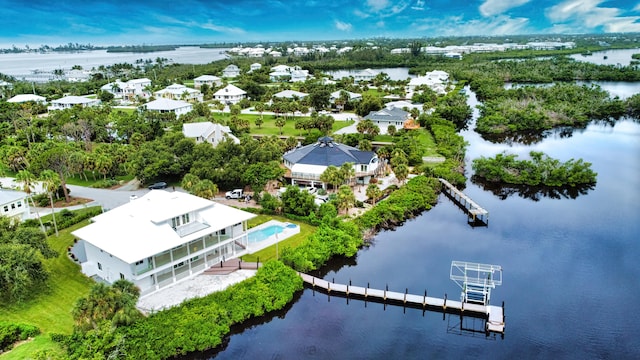 drone / aerial view with a water view