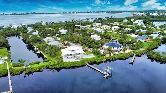 drone / aerial view with a water view