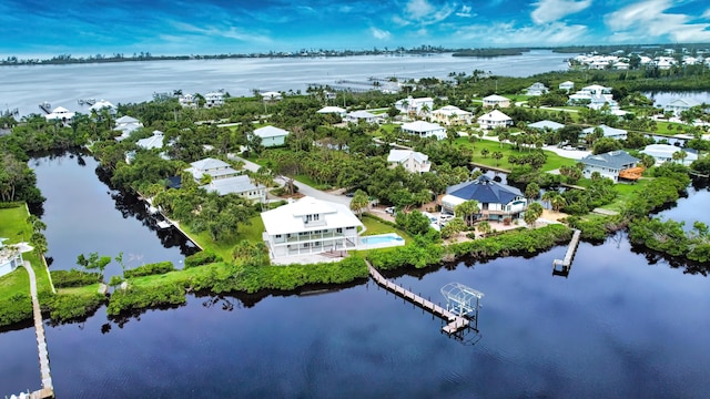 13064 Via Flavia, Placida, FL 33946 - aerial perspective of suburban area with a nearby body of water