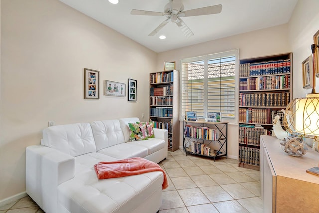 interior space featuring light tile patterned floors, baseboards, ceiling fan, and recessed lighting