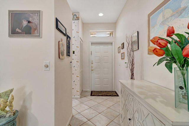 hallway with light tile patterned floors