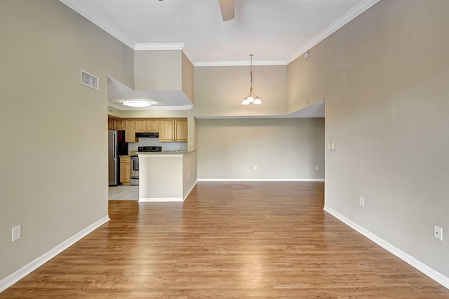 unfurnished living room featuring baseboards, light wood-style flooring, visible vents, and crown molding