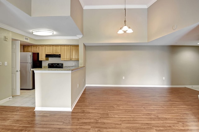 kitchen with ornamental molding, black range with electric stovetop, freestanding refrigerator, and under cabinet range hood