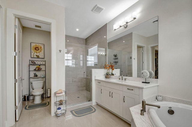 full bathroom with vanity, tile patterned flooring, toilet, and separate shower and tub