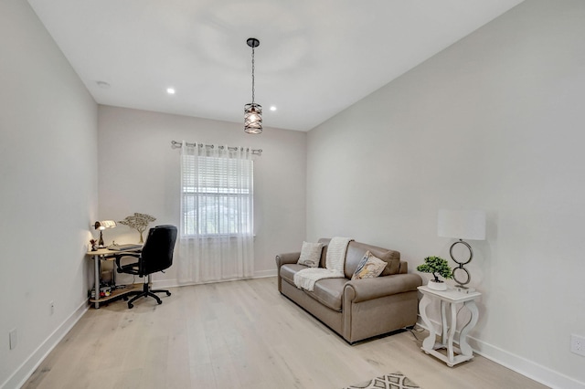 office space with light hardwood / wood-style flooring