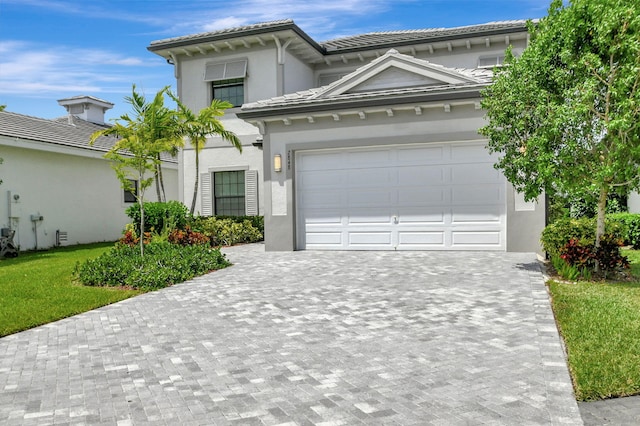 view of front of home with a garage