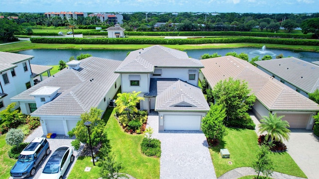 bird's eye view with a water view