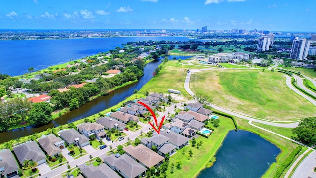 birds eye view of property featuring a water view