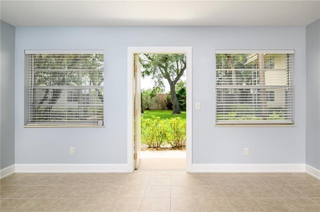 interior space featuring light tile patterned flooring