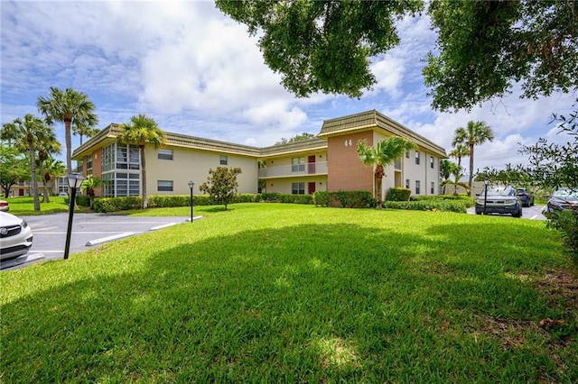 exterior space featuring a front yard