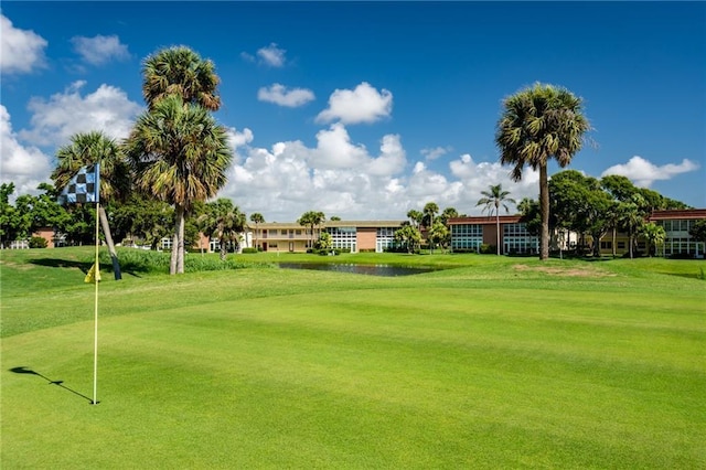 view of home's community featuring a lawn