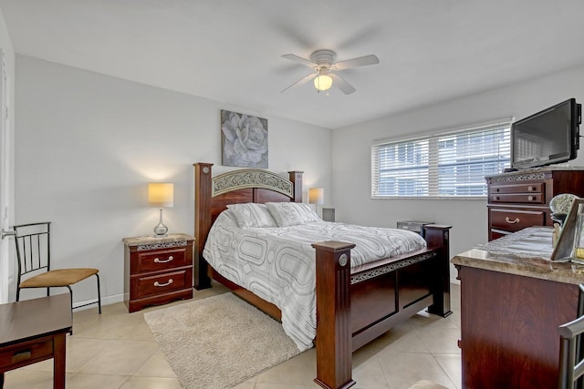 bedroom featuring light tile patterned floors and a ceiling fan