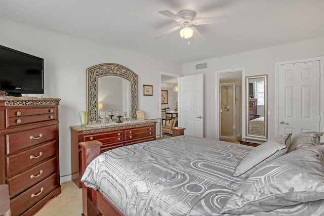 bedroom with ceiling fan and visible vents