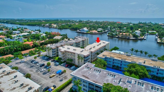 drone / aerial view with a water view