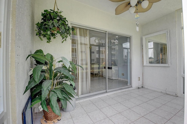 view of patio / terrace featuring ceiling fan