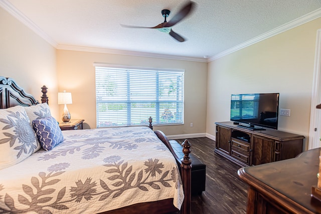 bedroom featuring ornamental molding, dark wood-type flooring, a textured ceiling, and ceiling fan