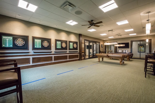 interior space with pool table, carpet, and ceiling fan