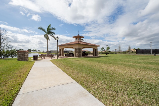 view of property's community featuring a yard and a gazebo