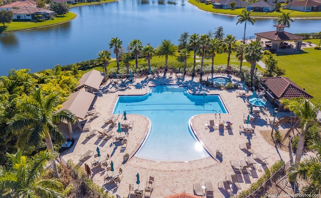 view of pool with a water view, a patio area, and a gazebo