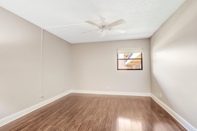 spare room featuring a textured ceiling, hardwood / wood-style floors, and ceiling fan