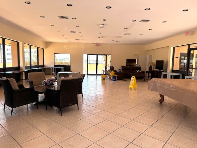 tiled dining room with billiards