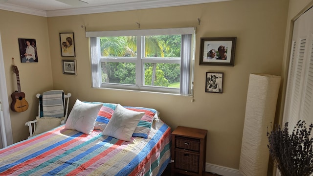 bedroom with crown molding