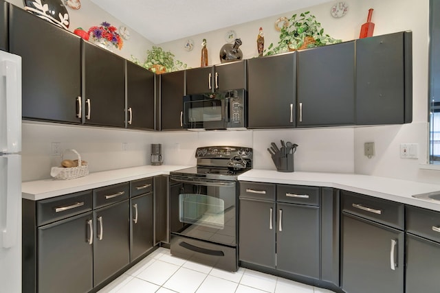 kitchen with light tile patterned floors and black appliances