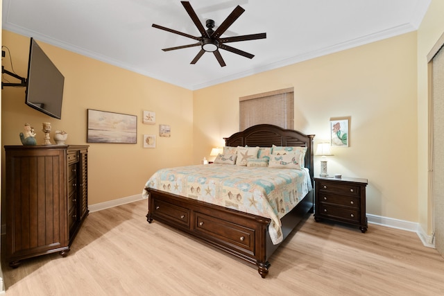 bedroom featuring ornamental molding, ceiling fan, and light hardwood / wood-style floors