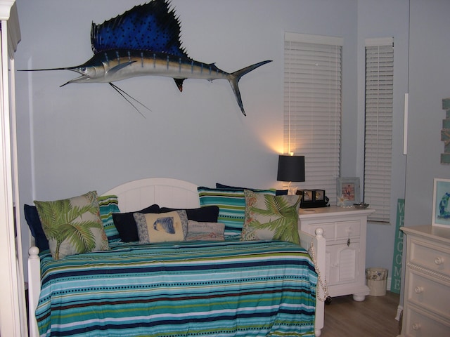 bedroom featuring hardwood / wood-style flooring