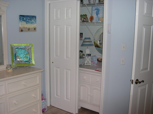 bedroom with wood-type flooring