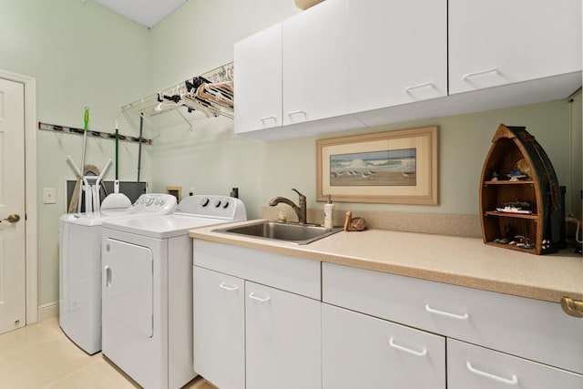 laundry room with separate washer and dryer, a sink, light tile patterned floors, and cabinet space