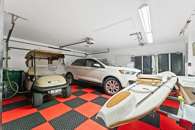 garage featuring a garage door opener