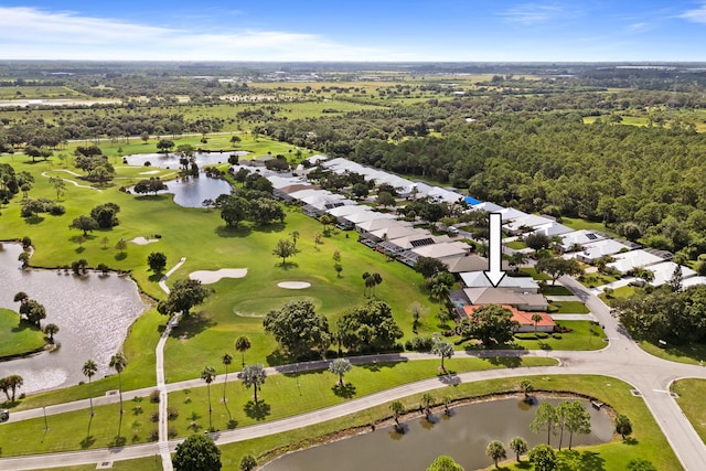 bird's eye view with a residential view, golf course view, and a water view