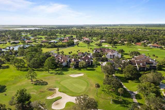 aerial view with a water view, golf course view, and a residential view
